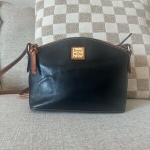Dooney & Bourke Black with tan/cognac accents medium cross body bag.